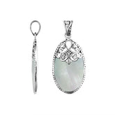 Sterling silver oval pendant with luminous Mother of Pearl inlay and delicate Balinese filigree design, handcrafted in Bali.